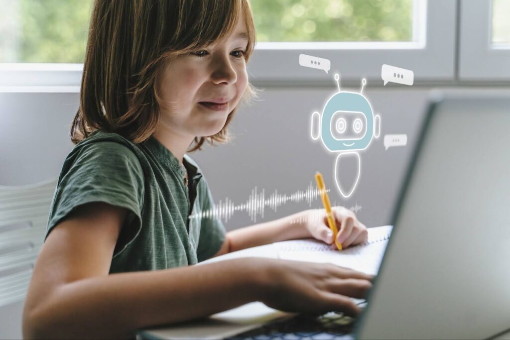 A child writing in a notebook uses an AI chatbot on a laptop computer to assist in completing an assignment.